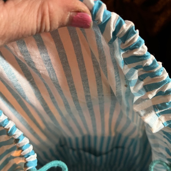 A Large, Thick Basket Bag with an Expandable Striped Cloth that’s says LOVE - Picture 6 of 7